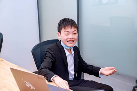 Boy explaining