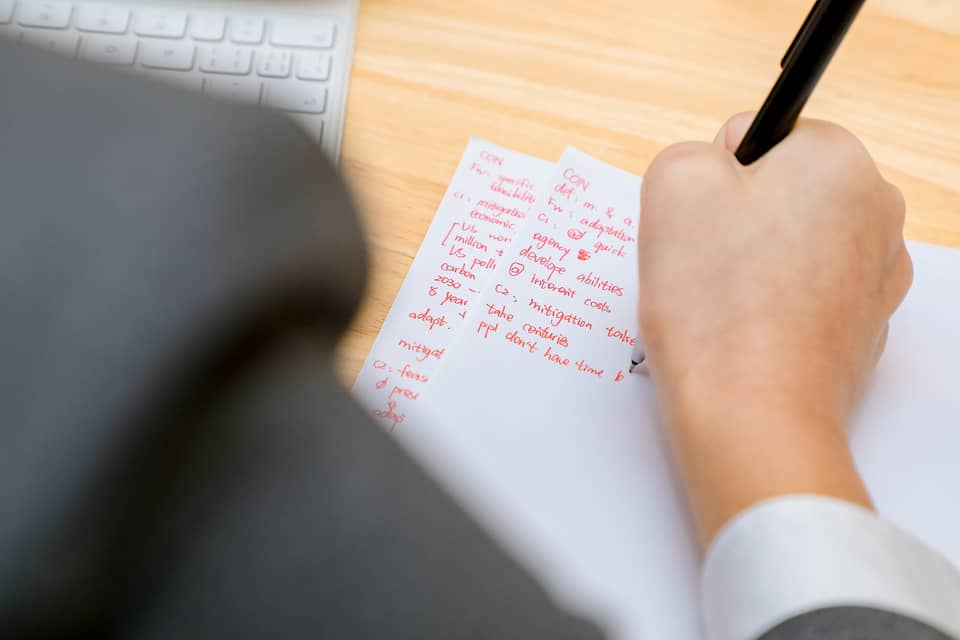 lots of writing on paper